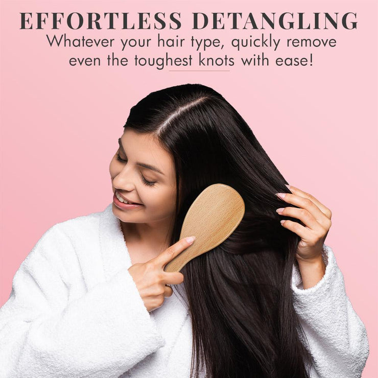 Our Wooden Paddle Brush removes even the toughest knots with ease. Here you can see the effortless detangling on our gorgeous models hair. 