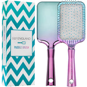 Our Mermazing pink and blue ombre Paddle Brush. It comes in a blue ombre zig zag patterned packaging which is also sustainable and eco- friendly.