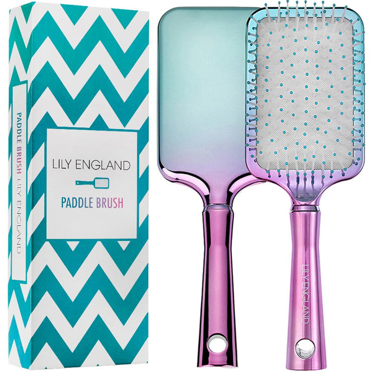 Our Mermazing pink and blue ombre Paddle Brush. It comes in a blue ombre zig zag patterned packaging which is also sustainable and eco- friendly.